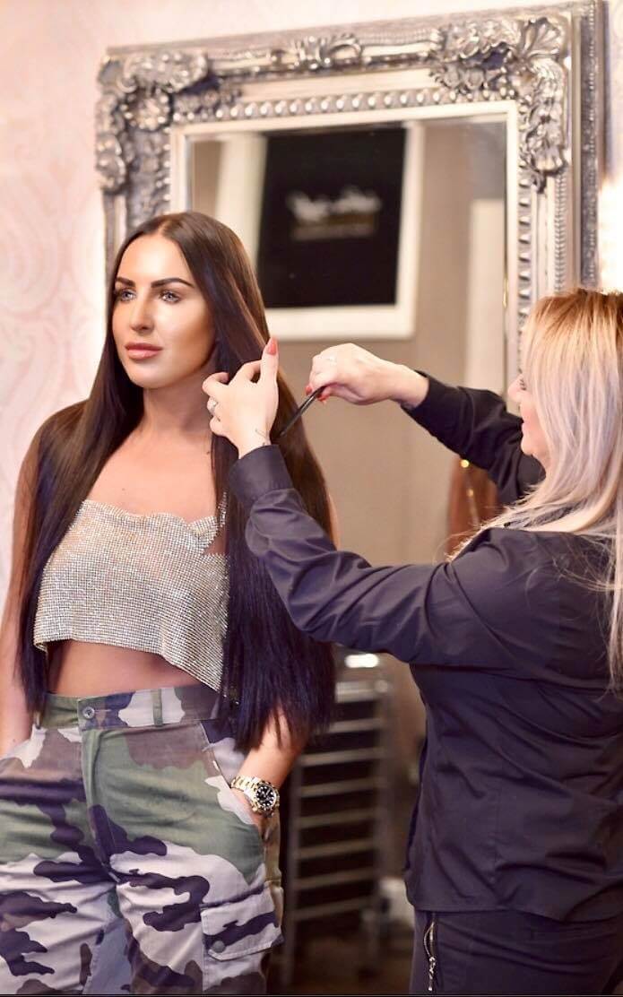 Girl with long, brown hair extensions